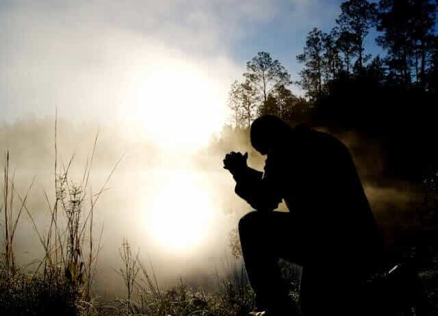 A person praying in the morning